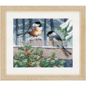 stickpackung koolmeesjes op tuinhek in wintersfeer