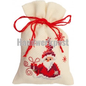 stickpackung kräutertütchen, kerstman met cadeautje