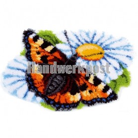 knüpfdecke vlinder op margriet
