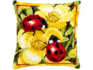 kreuzstichkissen lieveheersbeestjes op boterbloemen