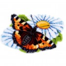 knüpfdecke vlinder op margriet