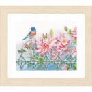 stickpackung vogel op tuinhek